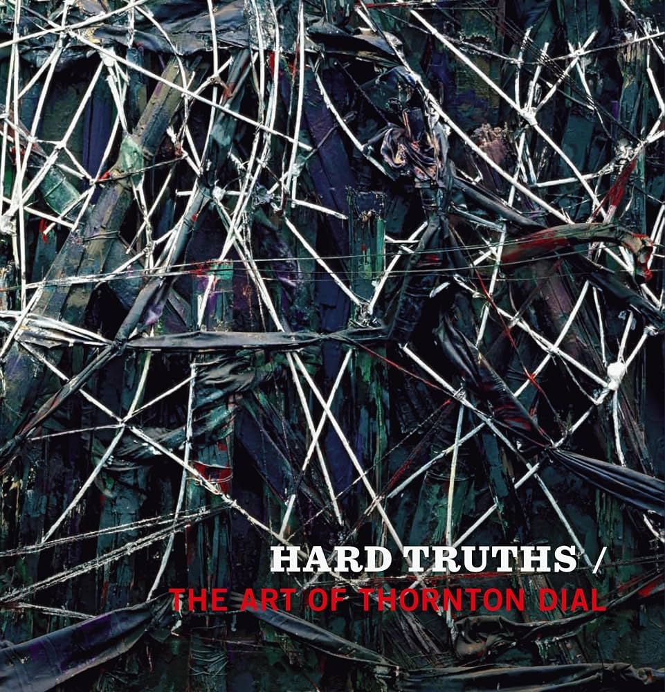 Cover of the book Hard Truths: The Art of Thornton Dial, 2011, showing a dark work threaded with pale branching lines and netting, the title set across the lower half in red and white.