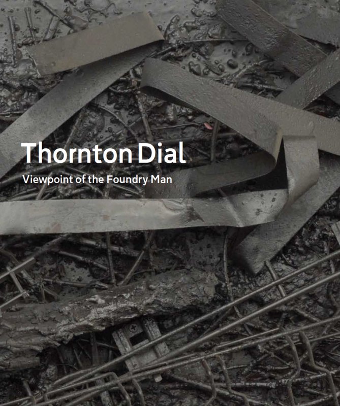 Front cover of Thornton Dial: Viewpoint of the Foundry Man. A black and white photograph of flattened steel straps and lengths of wire laid over a thick tarry surface, with the artist's name and title in white type at the left.