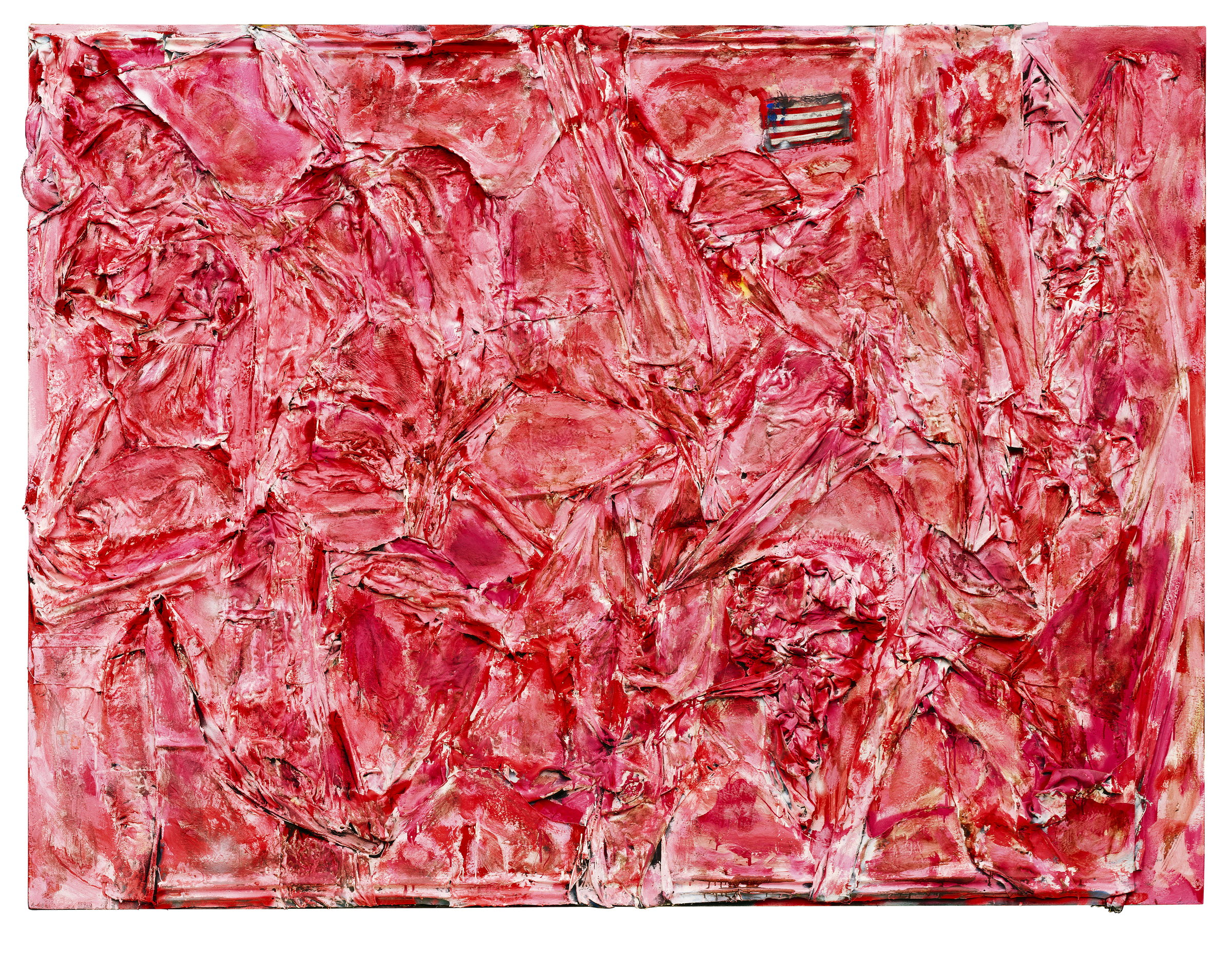 A wide panel entirely in red and raw pink, worked into folds and flaps of torn cloth and tin that hang and overlap like sides of meat on a rail. The one interruption is a small painted American flag near the top right, no bigger than a hand, in blue, red and white.